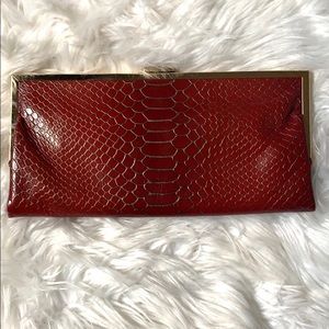 Hobo clutch. Red embossed leather with gold clutch